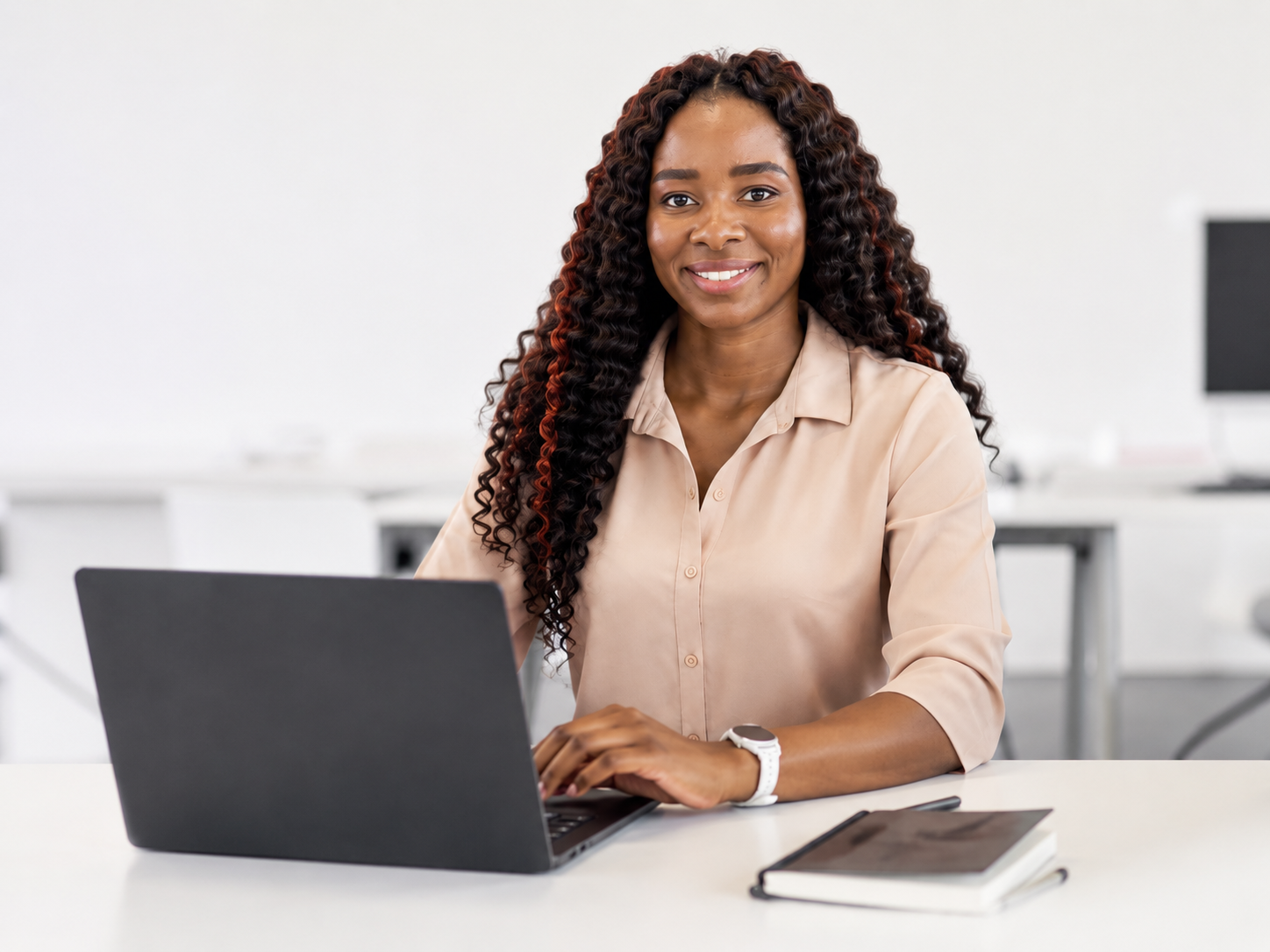Founder of Build Before 30 at her workspace